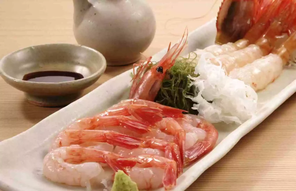 What is Shrimp Sashimi? Shrimp sashimi is a popular Japanese delicacy at Japanese restaurants that features raw, succulent shrimp.